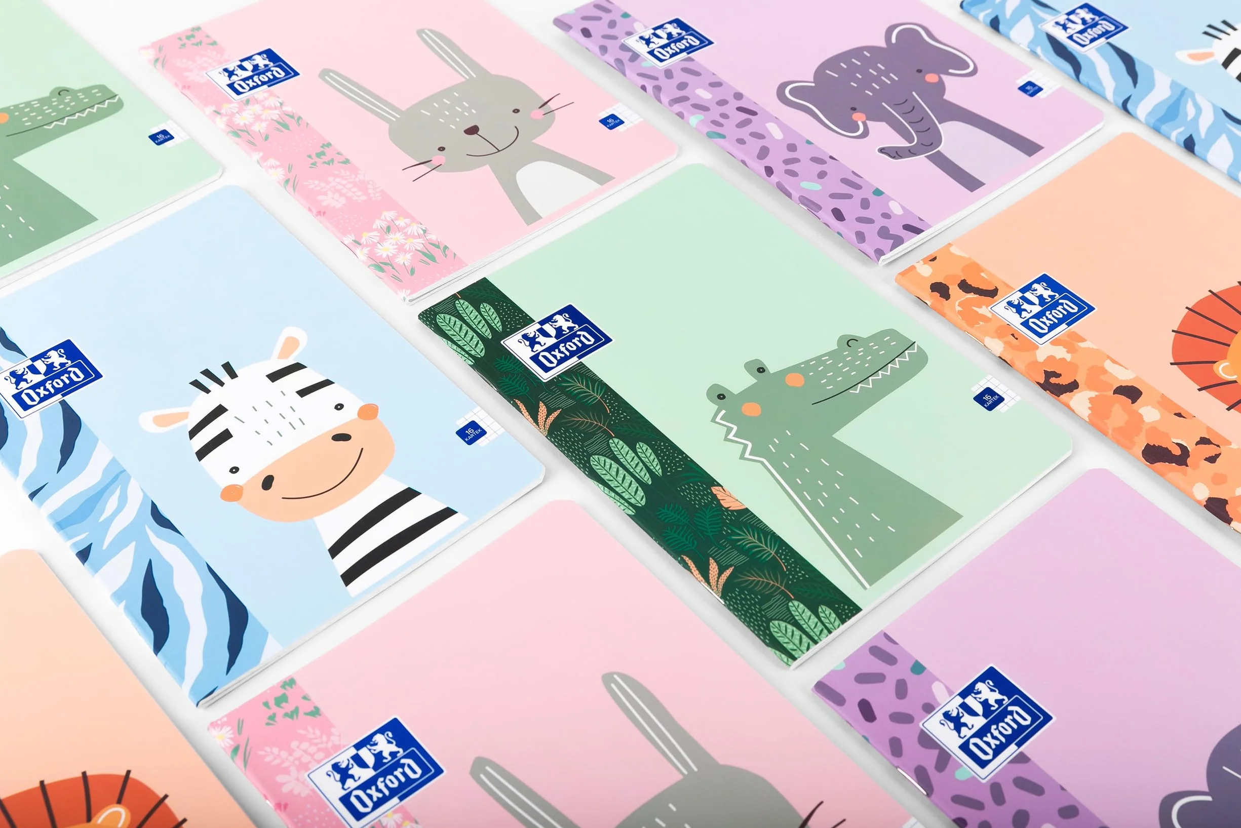 Oxford Zeszyt szkolny A5, 32 arkusze w linie z boczną krawędzią, papier o wyglądzie 90 g, miękka laminowana koperta, zestaw notatników do biura i szkoły, opakowanie 10 sztuk, mieszanka kolorów